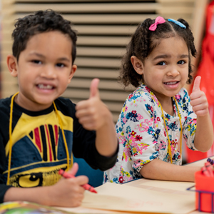 Spanish kids giving a thumbs up